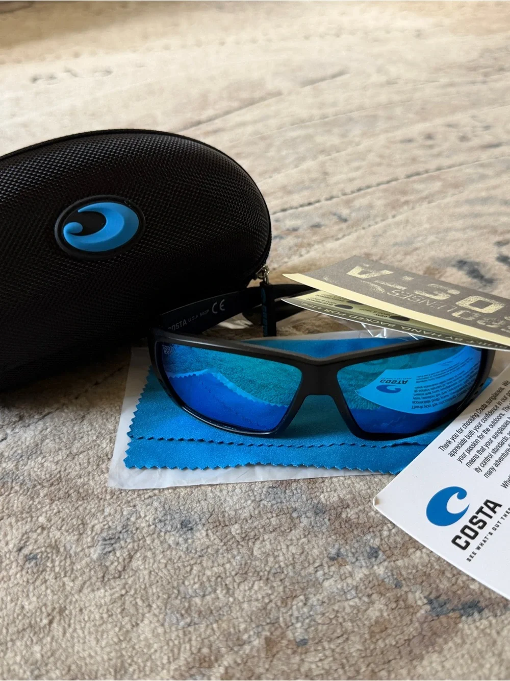 Costa Black Frame Sunglasses with Blue Mirrored Lenses